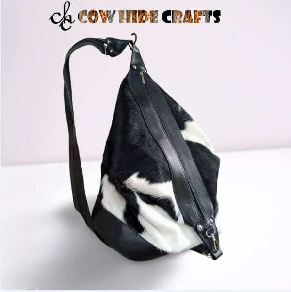 Black cowhide bucket bag dual backpack straps mode