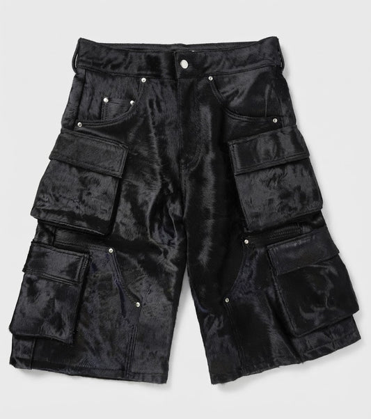 Silver rivet cargo pocket detail on black cowhide shorts