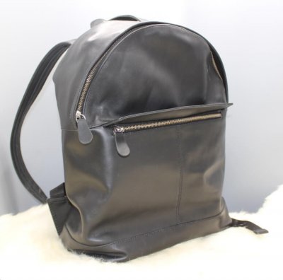 Black leather backpack main zipper closure