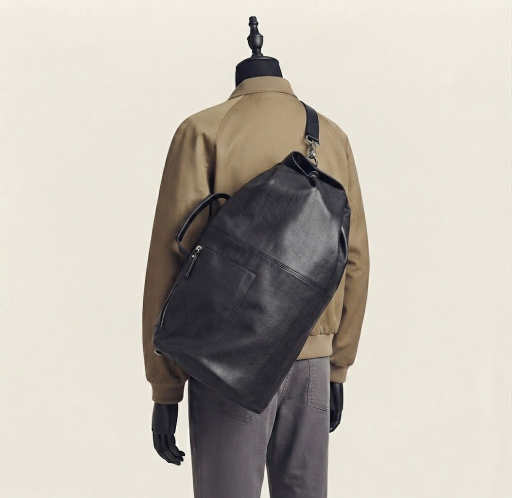 Black leather duffle backpack front view