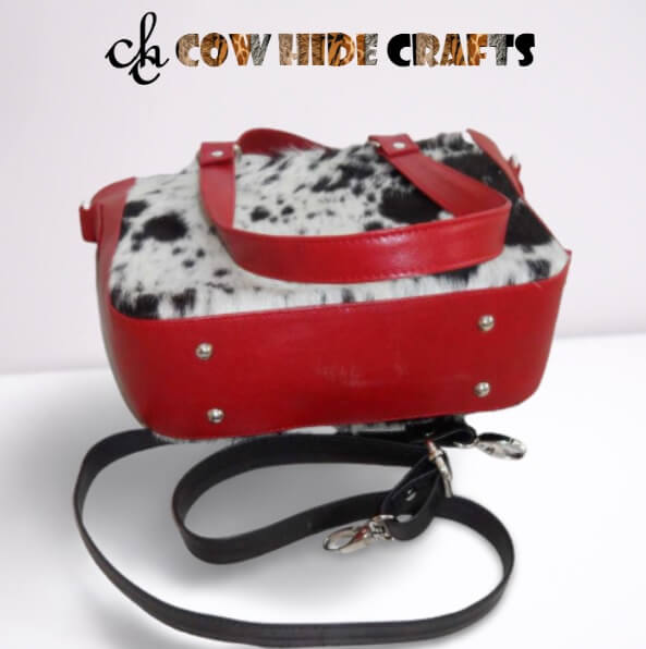 Black red cowhide bag front tassel rivet base detail