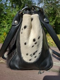 Black white cowhide bag dual leather handles