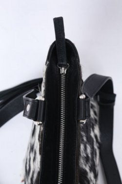 Black white cowhide bag leather sides zipper closure