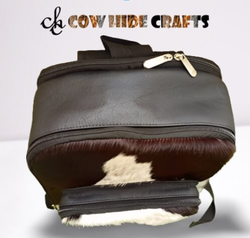 Black white cowhide backpack top handle