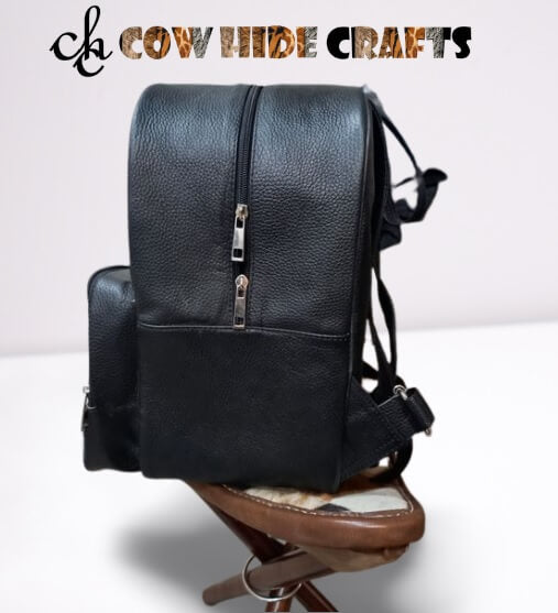 Black white cowhide camping bag side view