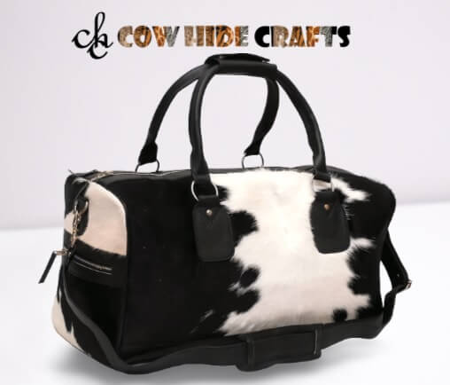 black white cowhide duffle bag