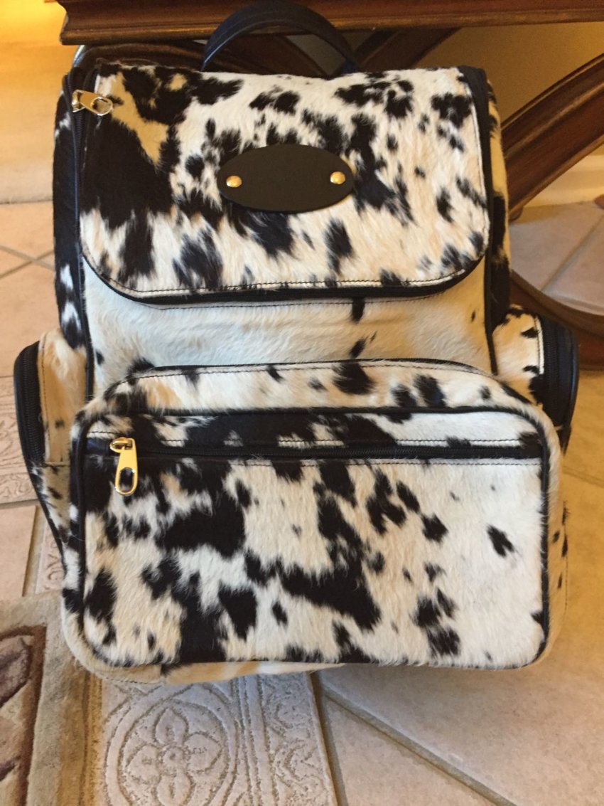 Black and white cowhide leather backpack made with genuine hair on hide