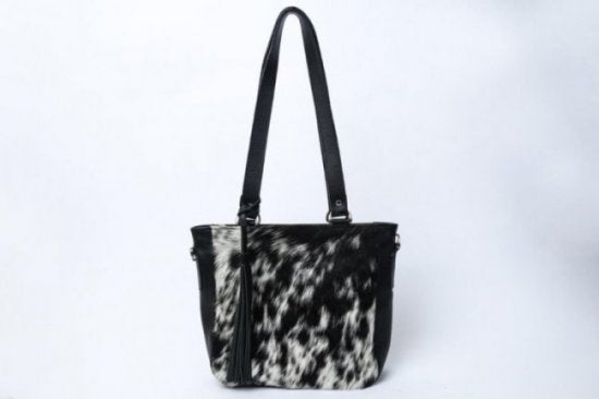 Black white cowhide messenger bag front view