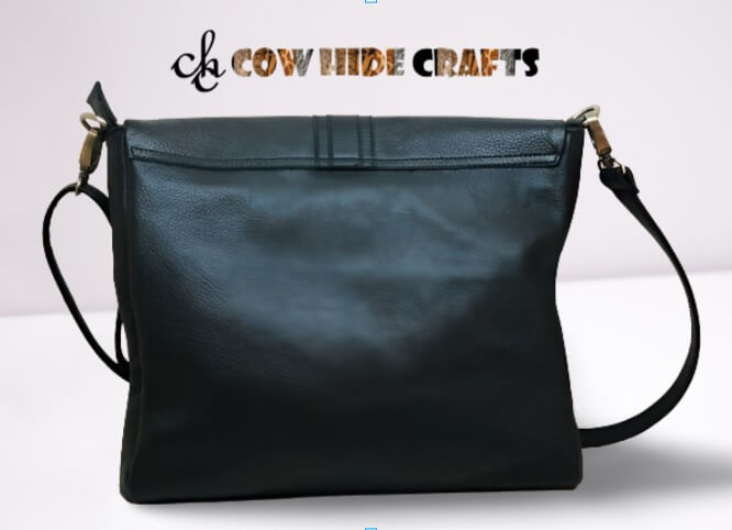 Black white cowhide messenger smooth leather back