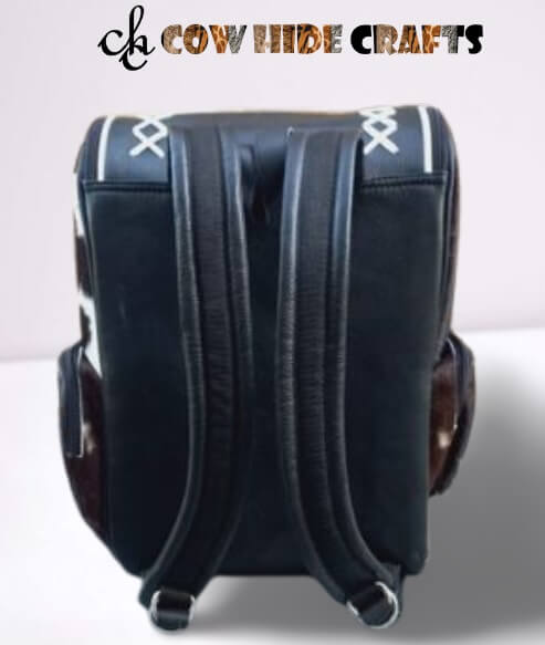 Black white cowhide personalized backpack backside view 