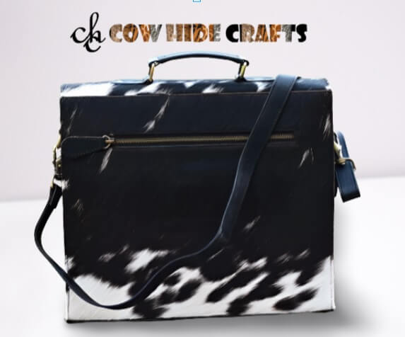 Black white cowhide satchel backside zipper pocket