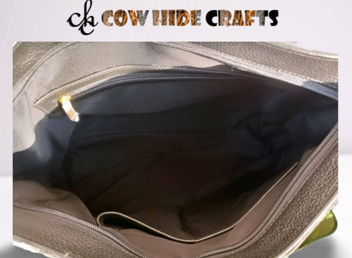 Black white cowhide tote main zipper interior