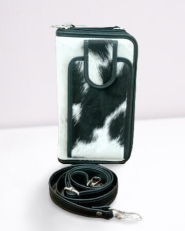 Black white cowhide vertical pouch front view