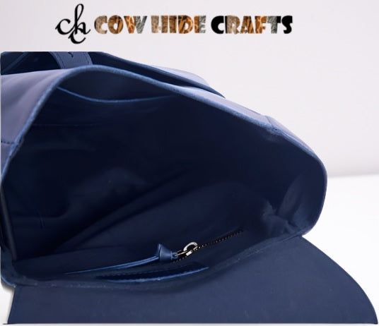 Blue leather daypack interior organized