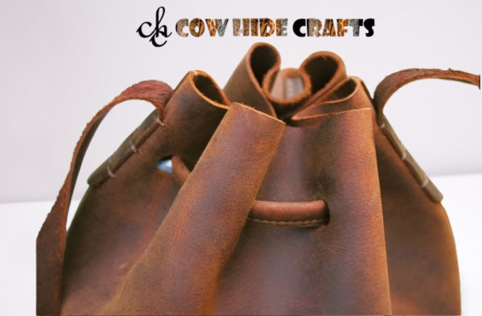 Brown distressed leather bucket bag women styled boho look