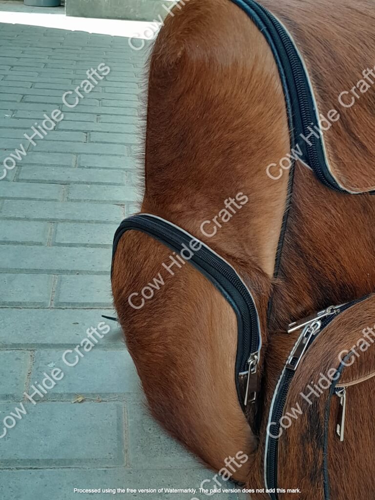 Brindle cowhide rucksack four outside pockets