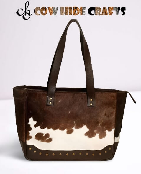 Brown cowhide bag metal rivets punched front panel