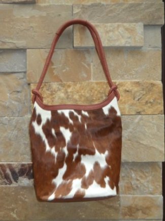 brown cowhide bucket bag