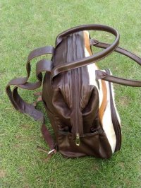 Brown cowhide mommy bag elastic side pockets