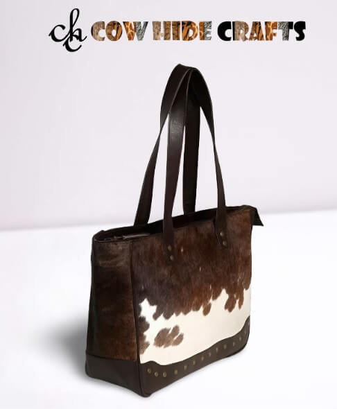 Brown cowhide shoulder bag metal rivets front