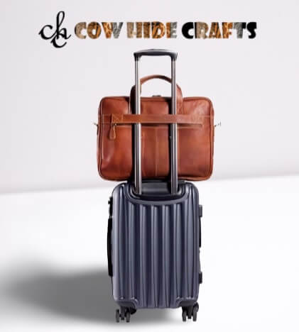 Brown leather travel briefcase trolley strap