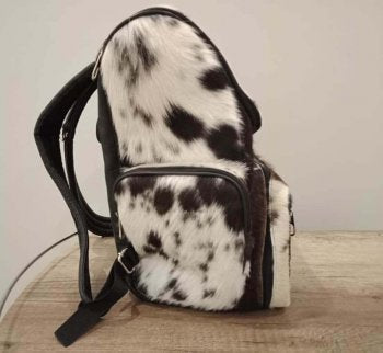 Brown white cowhide diaper bag side view