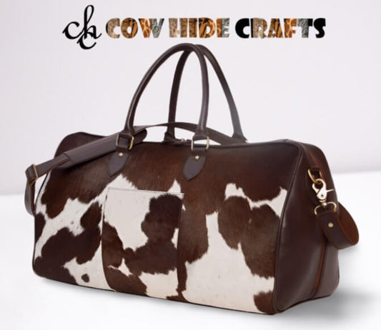 Brown white cowhide duffle long zipper weekender