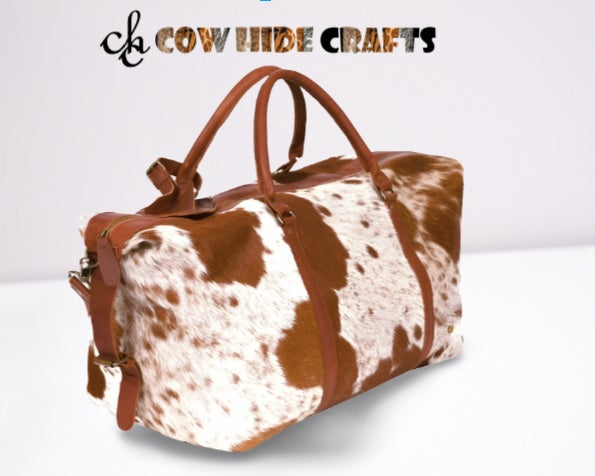 brown white cowhide travel duffle