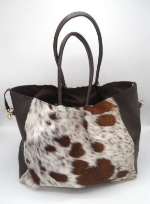 brown white cowhide bag