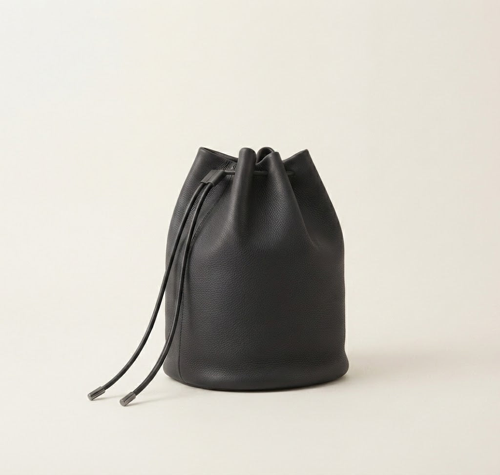 Calfskin drawstring bucket backpack in matte black