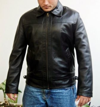 Men's simple black leather bomber jacket styled for daily wear