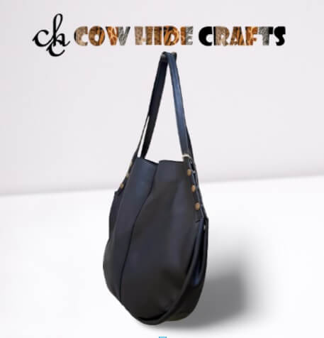 Black leather hobo bag styled for casual everyday carry