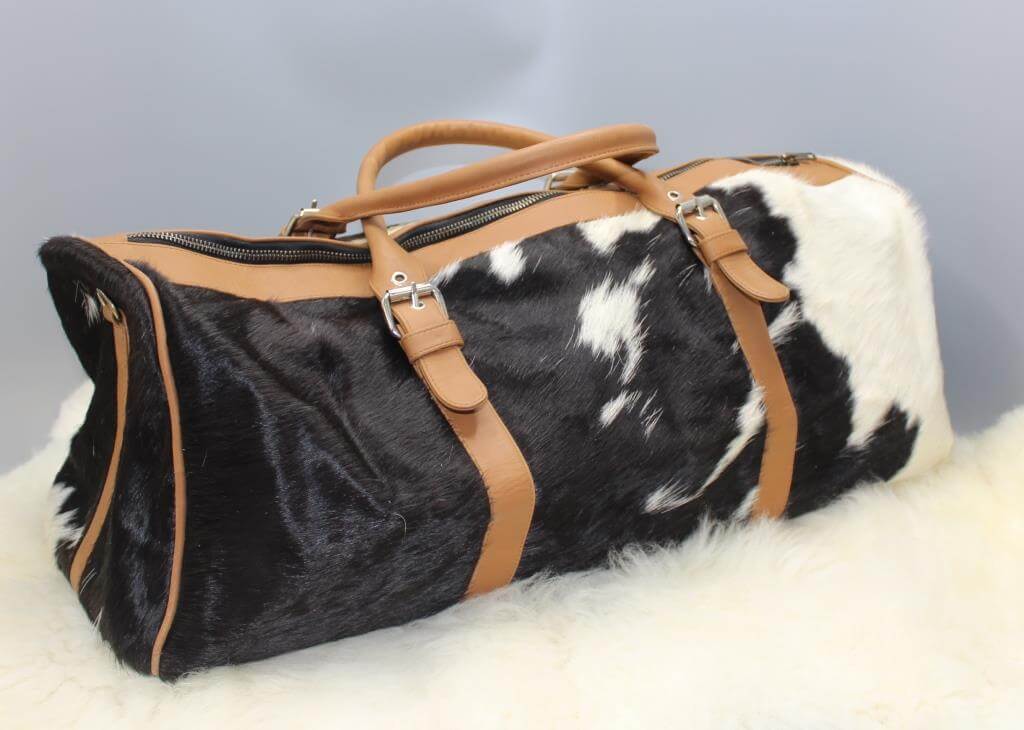 black white cowhide camping duffle bag