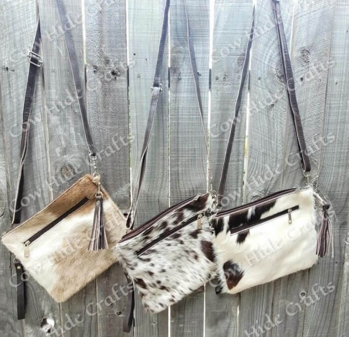 Cowhide clutch fringe tassel wristlet detail