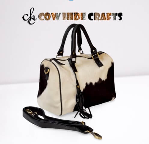 Cowhide compact duffle bag