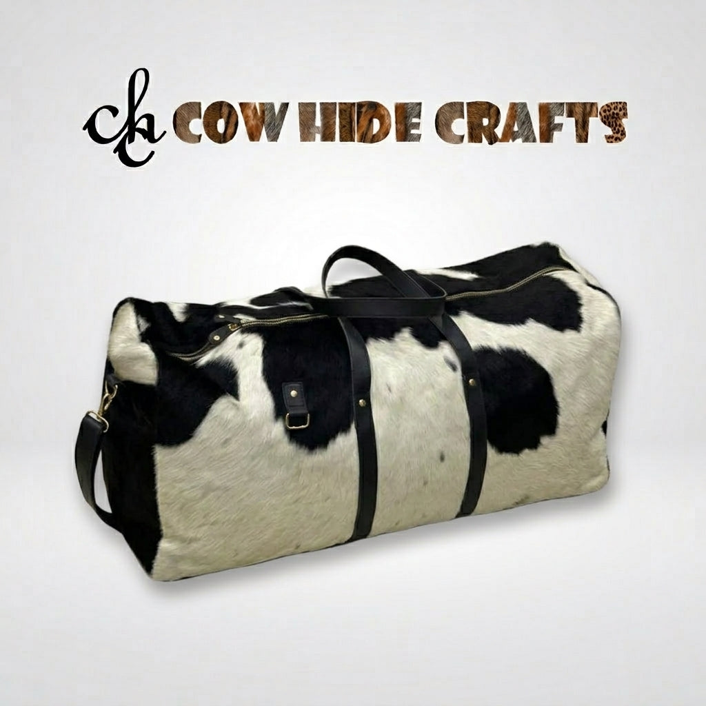 Dual leather top handles on hair-on cowhide sports duffel bag