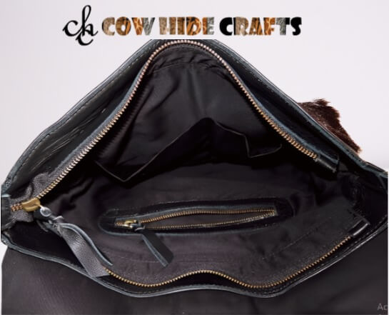 Cowhide messenger bag lined interior zipper pocket