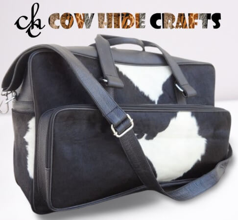 black and white cowhide nappy duffle bag