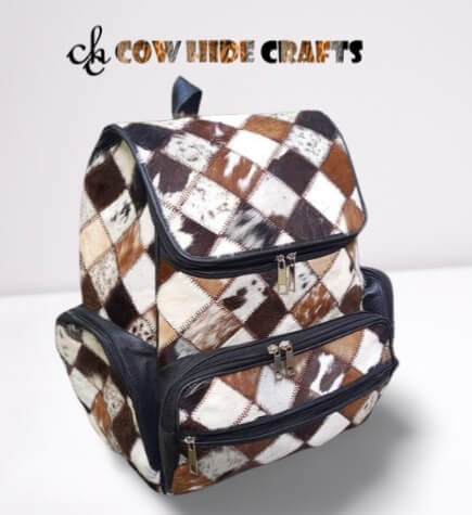 Cowhide patchwork backpack tan brown white