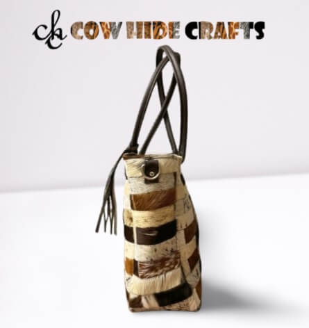 Cowhide patchwork bag tassel and zipper