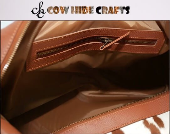 cowhide patchwork travel duffle