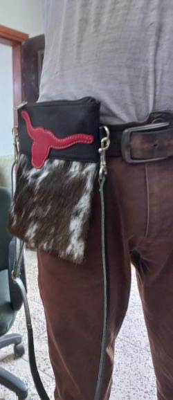 Cowhide rodeo clutch bull sign front detail