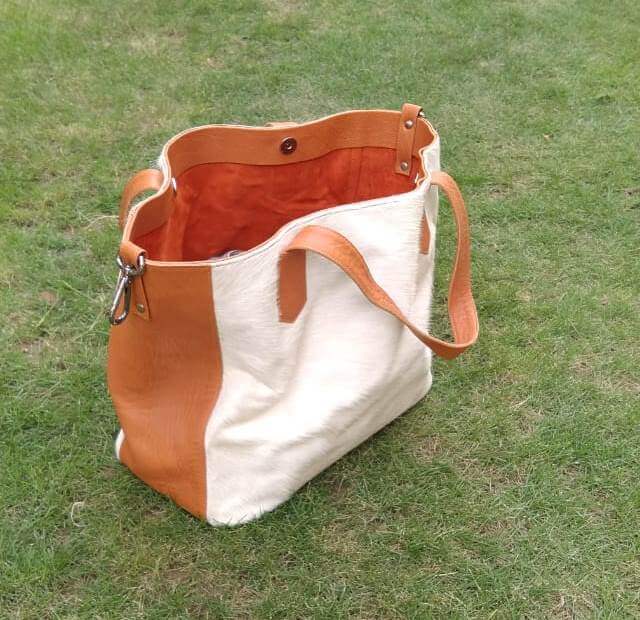 Cowhide shopper bucket bag white tan leather