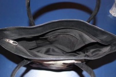 Cowhide shoulder tote leather handles detail