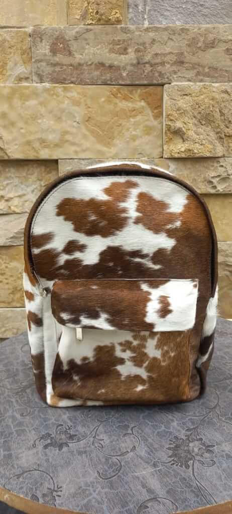 Cowhide sphere backpack tan white hair on