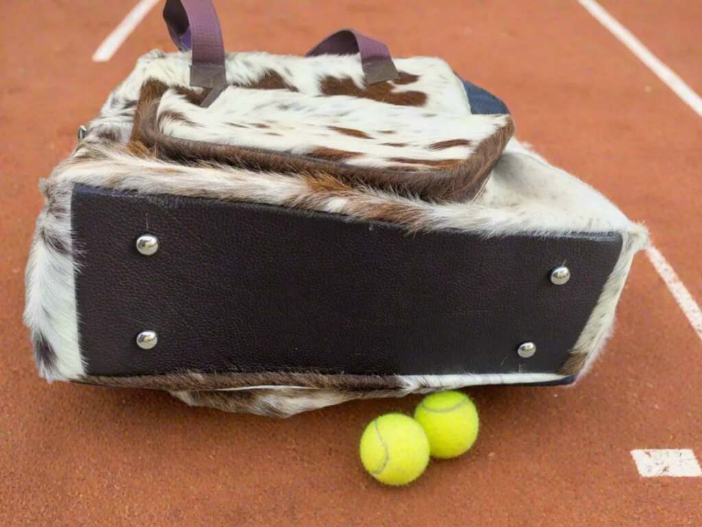 Cowhide sports bag leather riveted base