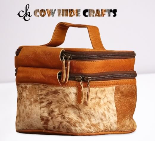 Cowhide vanity travelling tan and white kit bag