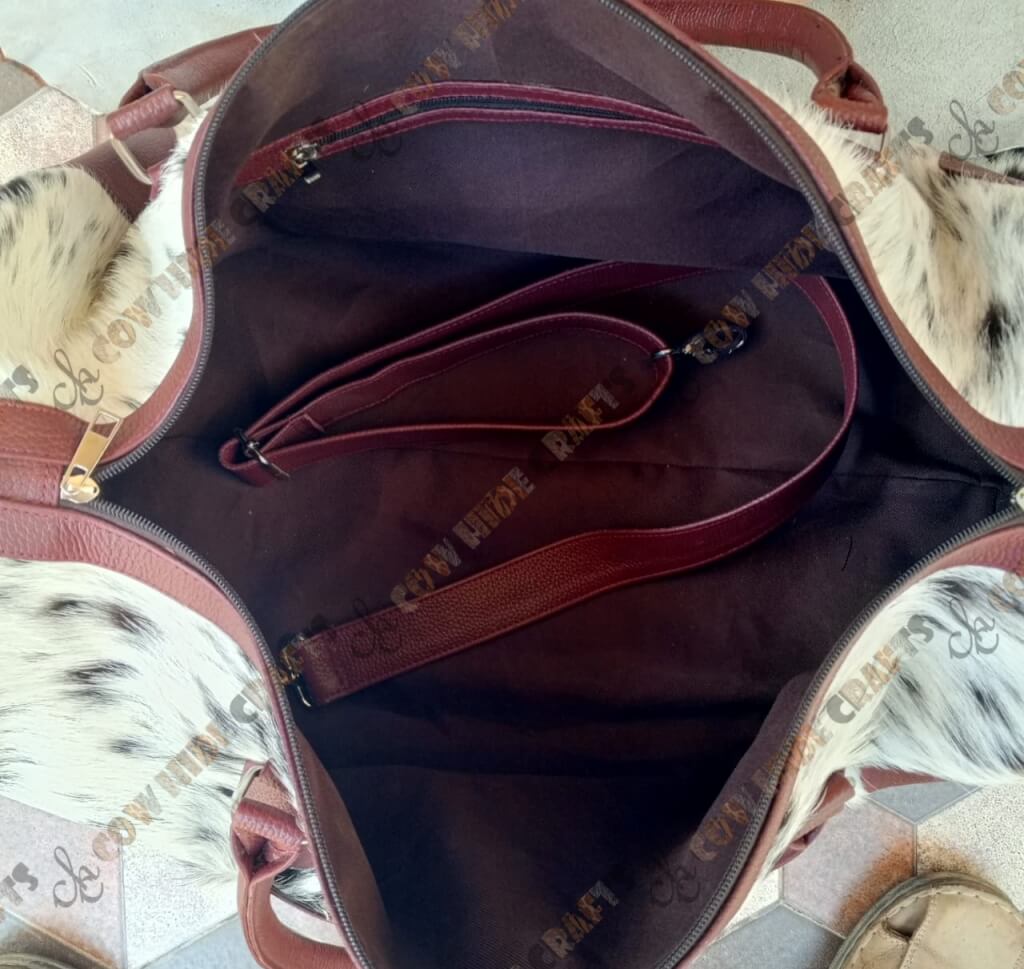 Cowhide duffle with wine leather 