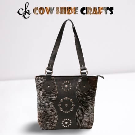 Crafting style cowhide tote bag metal rivets
