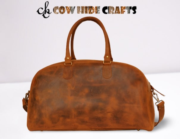 Curvy silhouette detail on brown vintage leather duffle bag